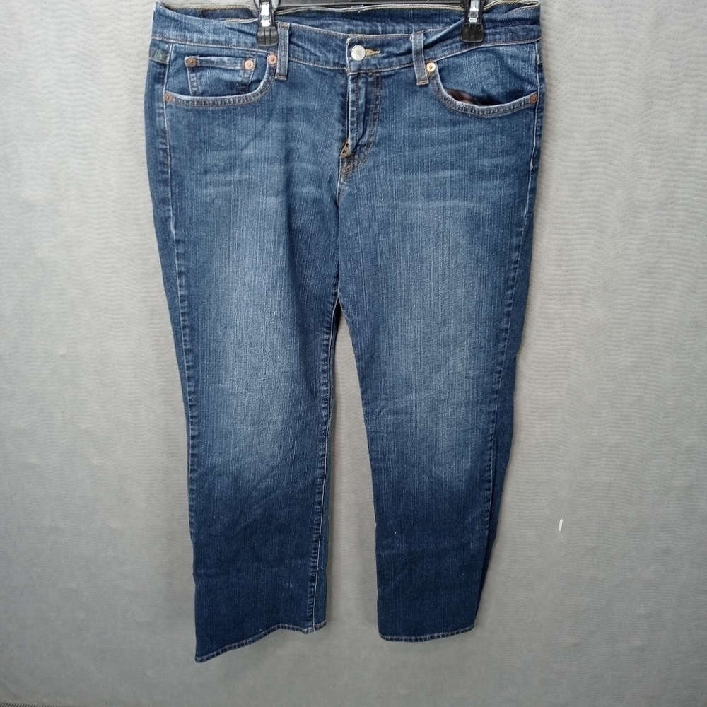 Lucky Brand women's blue. Mid-rise flair Jeans dungarees sz 12. 31x34. 9" rise.
